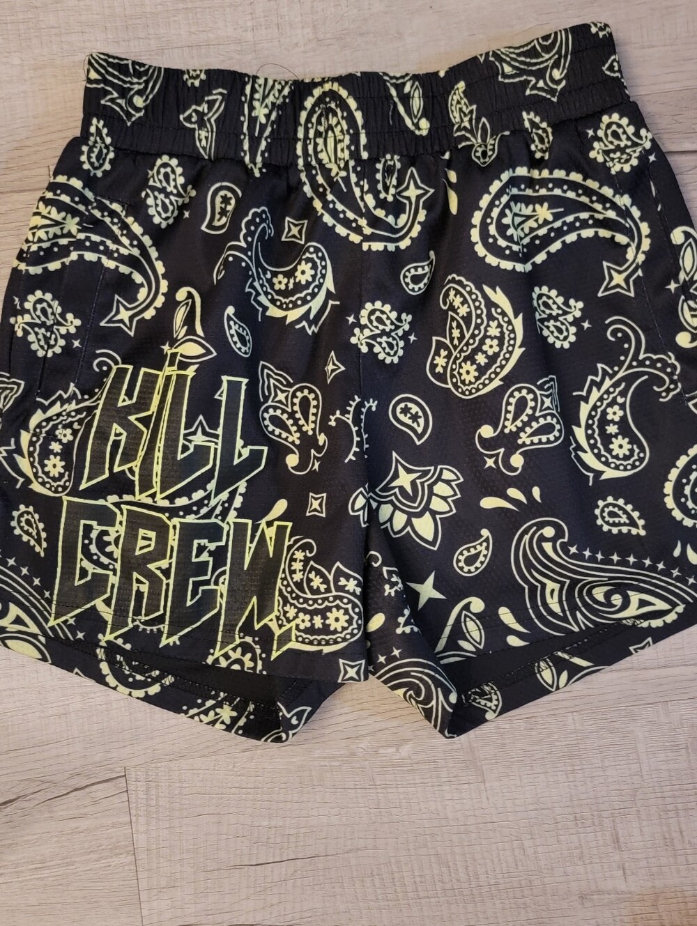 Kids Black Paisley Active Shorts with Neon Yellow Print